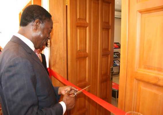 Dr Kwabena Duffuor, Minister of Finance and Economic Planning cutting the tape to inaugurate the Economic and Commercial office of the Spain Embassy  - Kwabena Duffuor