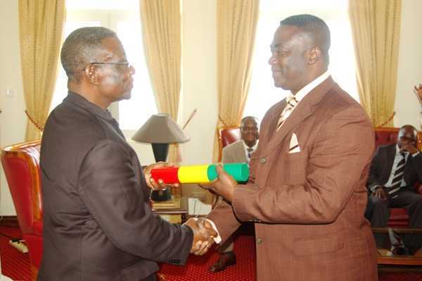 President Mills Presenting the Instrument of Office to Mr. Afote Agbo (Mp for Katamanso) Minister of State at the Presidency  - Afote Agbo