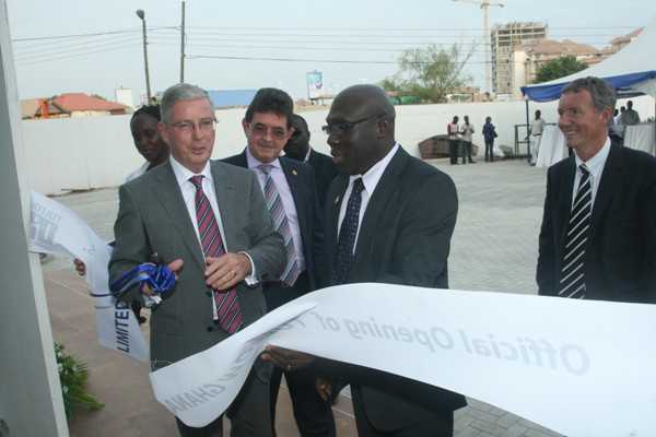 Deputy Minister, Energy, Alhaji Inusah Fuseini Assisting Mr. Pat Plunvett, Board Chair Of Tullow Oil, To Cut The Tape To Open Tullow's New Offices  - Alhaji Inusah Fuseini