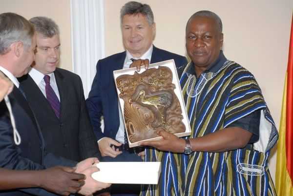 Vice President John Mahama Displays a Souvenir from the Russian and Belarus Business Delegation Led By Mr. Tkachuk Anatoly Board Member of Rspp  - John Dramani Mahama