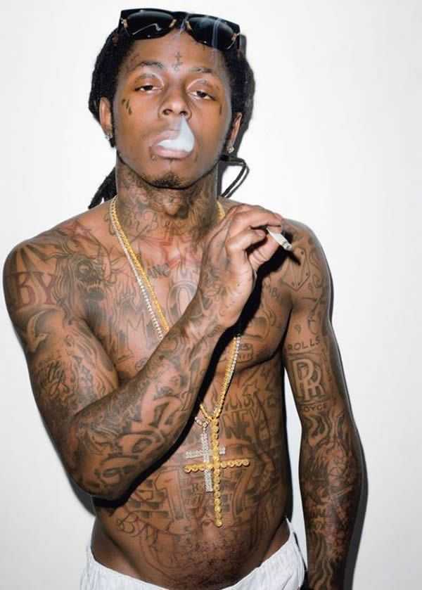 Lil Wayne Visits Tattoo Artist Spider Adds Even More Ink to His Face  PopStarTats