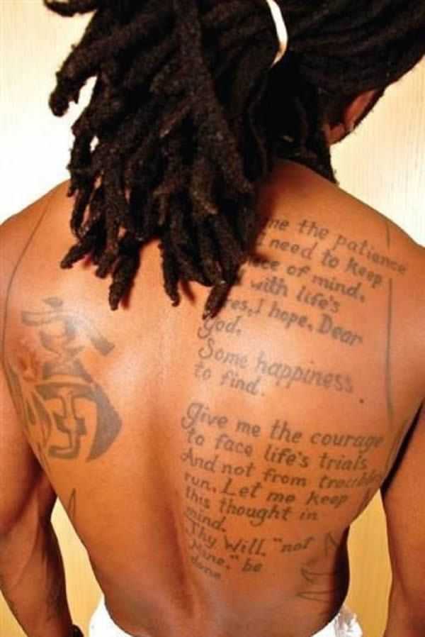 Lil Wayne has written his prayer on his back  - Praye