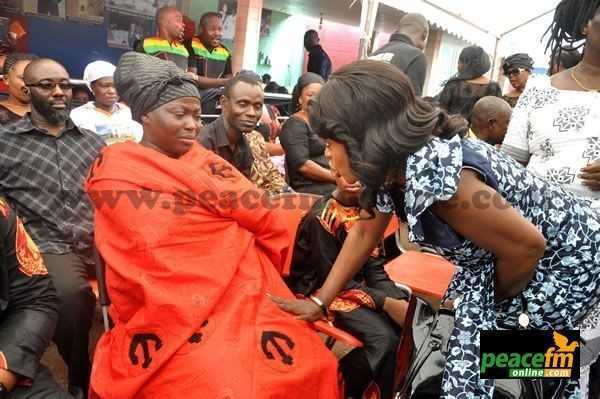 Akosua Agyapong consoling the widow   - Akosua Agyapong